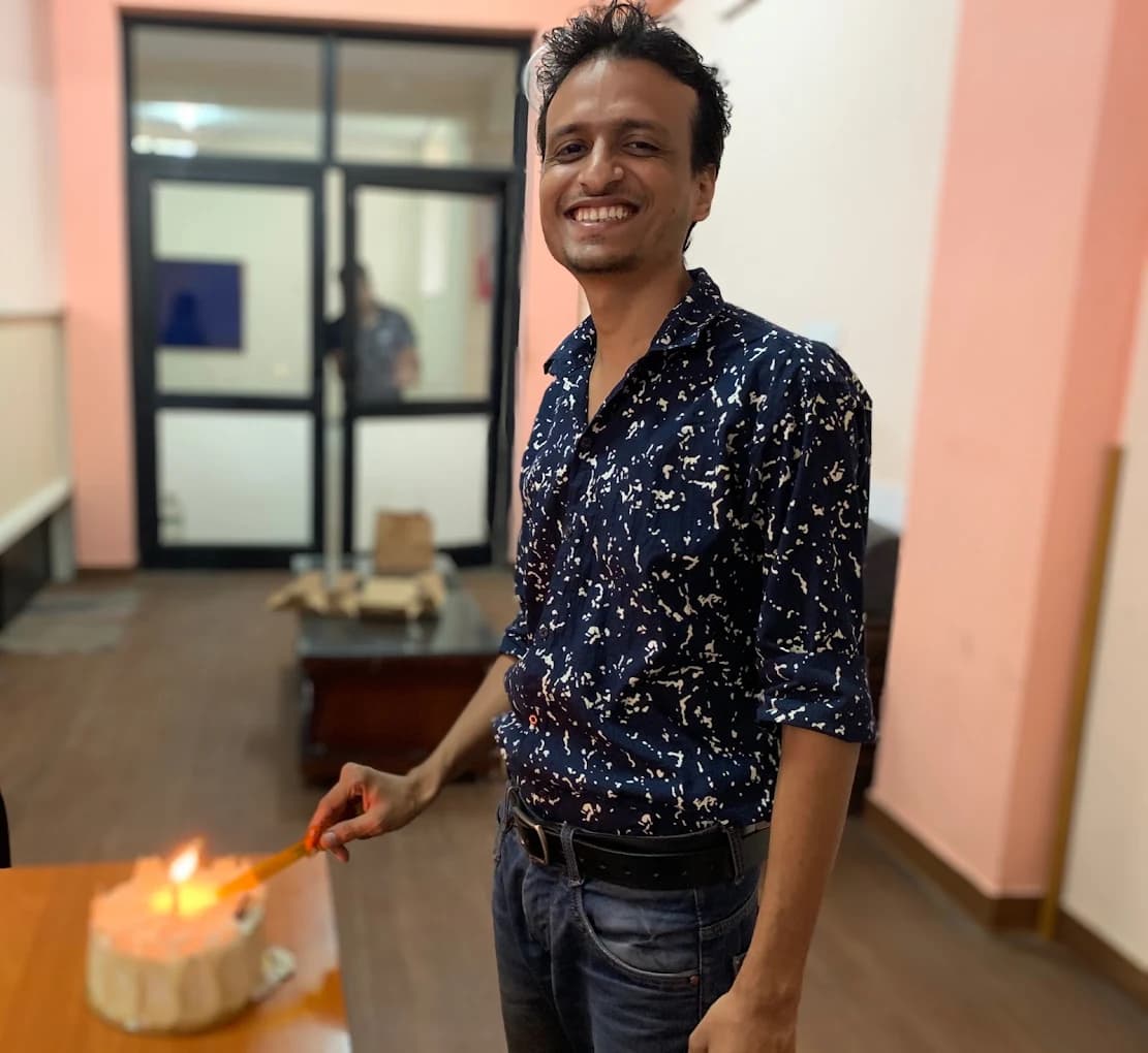 Office celebration with traditional diya lighting